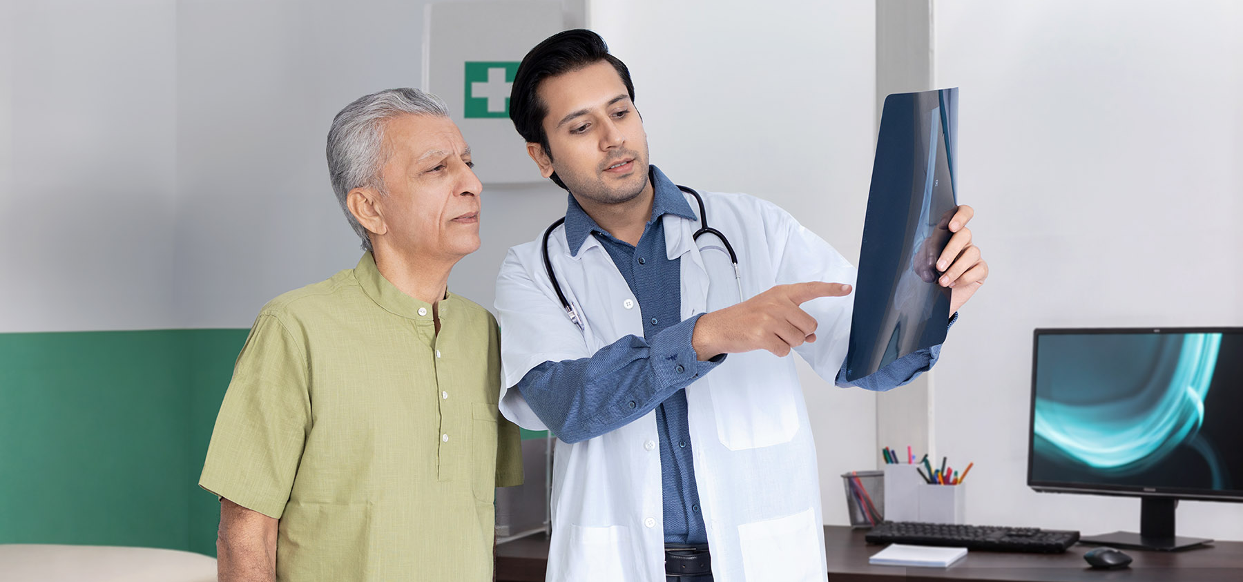 Dr. Sen in consultation with a patient